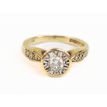 A 9ct yellow gold illusion set diamond solitaire ring, the diamond weighing approx 0.20, size I,