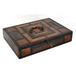 A 17th century Anglo-Portuguese colonial ebony and tulip wood parquetry table box with brass