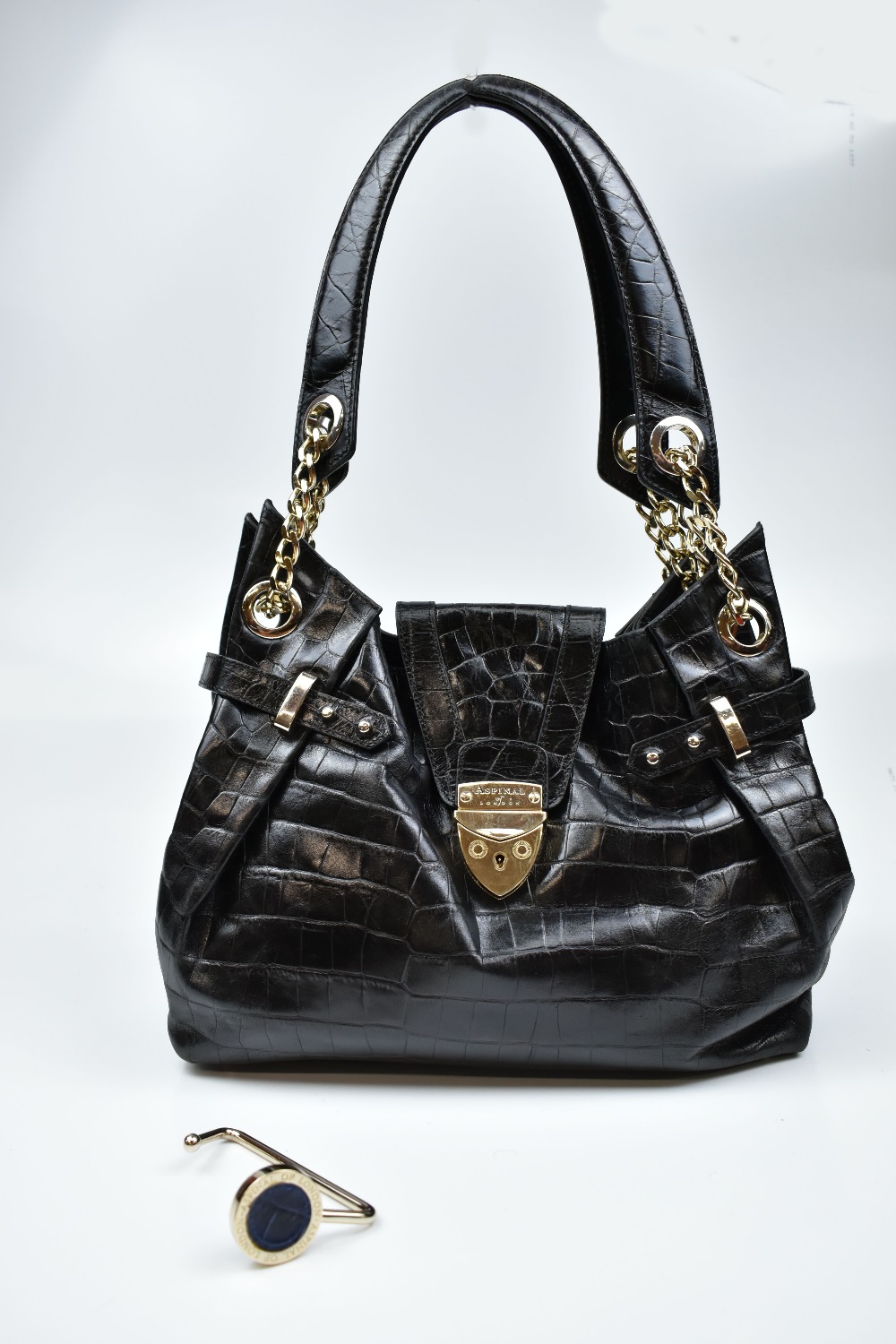 ASPINAL OF LONDON; a black embossed simulated crocodile leather 'Barbarella' handbag and an