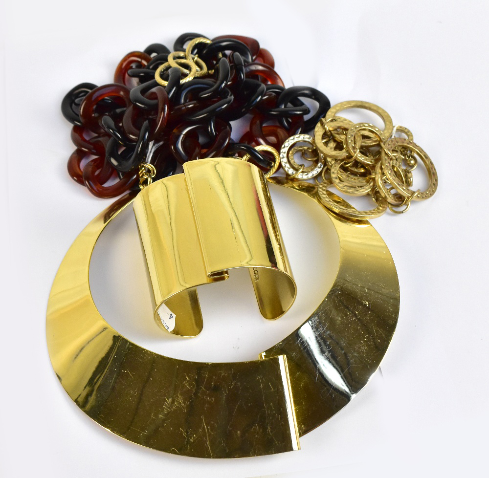 JAEGER; a gold toned metal cuff and matching collar, a faux tortoiseshell plastic chain necklace,