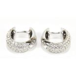 THEO FENNELL; a pair of 18ct white gold diamond set hoop earrings, length approx 1.4cm, approx 4.