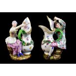 MEISSEN; a pair of mid-19th century figures seated beside large floral decorated jugs circa 1850,