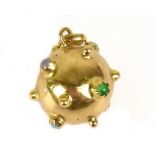 An 18ct yellow gold pendant of spherical form set with various semi-precious stones including