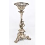 A Victorian silver plated centrepiece with pierced spreading supports above nymphs on three outswept