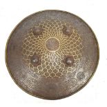 An early 19th century Indian shield (dhal) with script, floral and animal decorated border, four