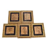 Five small relief moulded plaques depicting composers including Chopin and Liszt, all framed, the