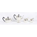S BLACKENSEE & SONS LTD; a George V hallmarked silver three piece tea service, with chased detail