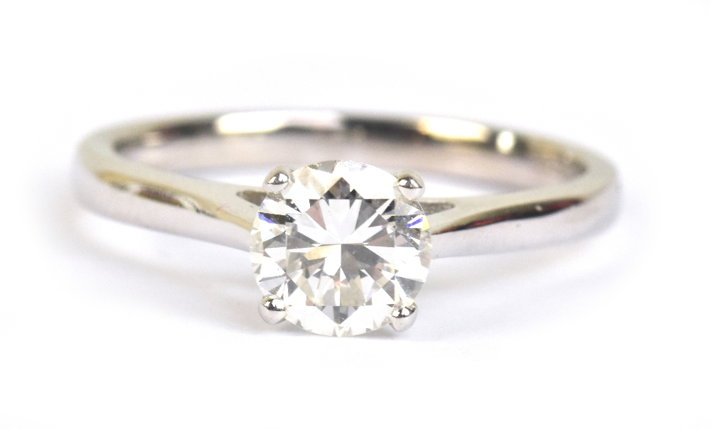 A good 18ct white gold diamond solitaire ring, the round brilliant cut stone weighting 1ct, graded