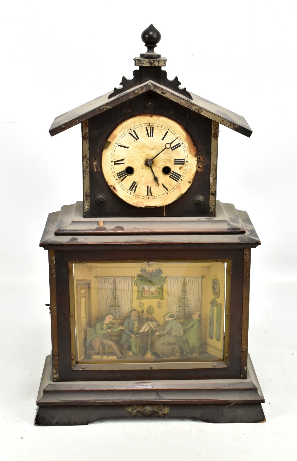 A late 19th century German automaton mantel clock with simple movement, applied paper dial and
