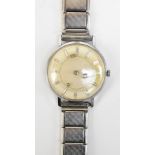LOUVICH; a gentleman's stainless steel seventeen jewel wristwatch, the circular dial set with