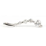 An 18ct white gold five stone graduated diamond pendant of swept design with diamond weight approx