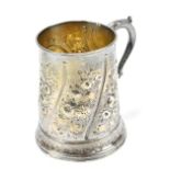 HESTER BATEMAN; a George III hallmarked silver christening mug initialled 'RTC' with repoussé