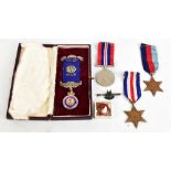 A WWII medal trio comprising War Medal, 1939-1945, and France and Germany Stars, also an ROAB