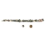 PANDORA; a silver charm bracelet with three stopper charms, and twenty-one assorted charms,