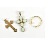 An 18ct yellow gold ring, cut, approx 1.8g, a 9ct yellow gold cross pendant, approx 1.1g, and a