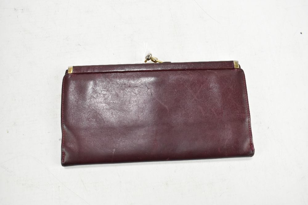 ASPREY OF LONDON; a vintage burgundy leather purse/card wallet, 18 x 9 x 2cm. - Image 2 of 2