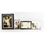 A collection of five Art Deco chrome framed photograph frames, largest example 23 x 18cm.