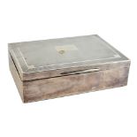 WILLIAM ADAMS LTD; a George V hallmarked silver rectangular engine turned cigarette box, inscribed