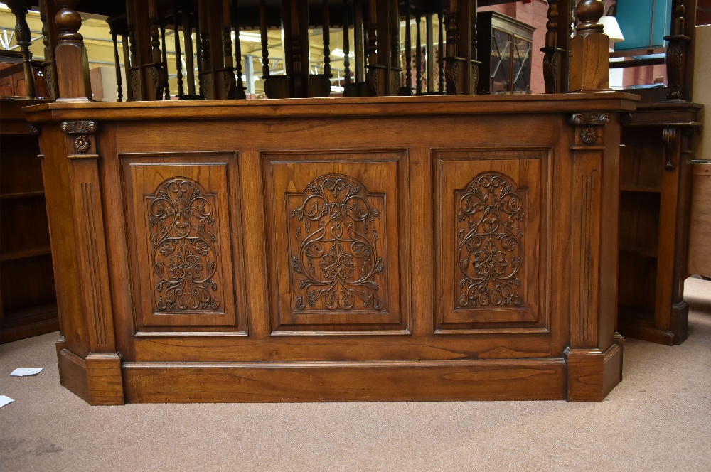 A large and impressive bar with triangular sectioned canopy above eight bevelled mirrors flanked - Image 2 of 7