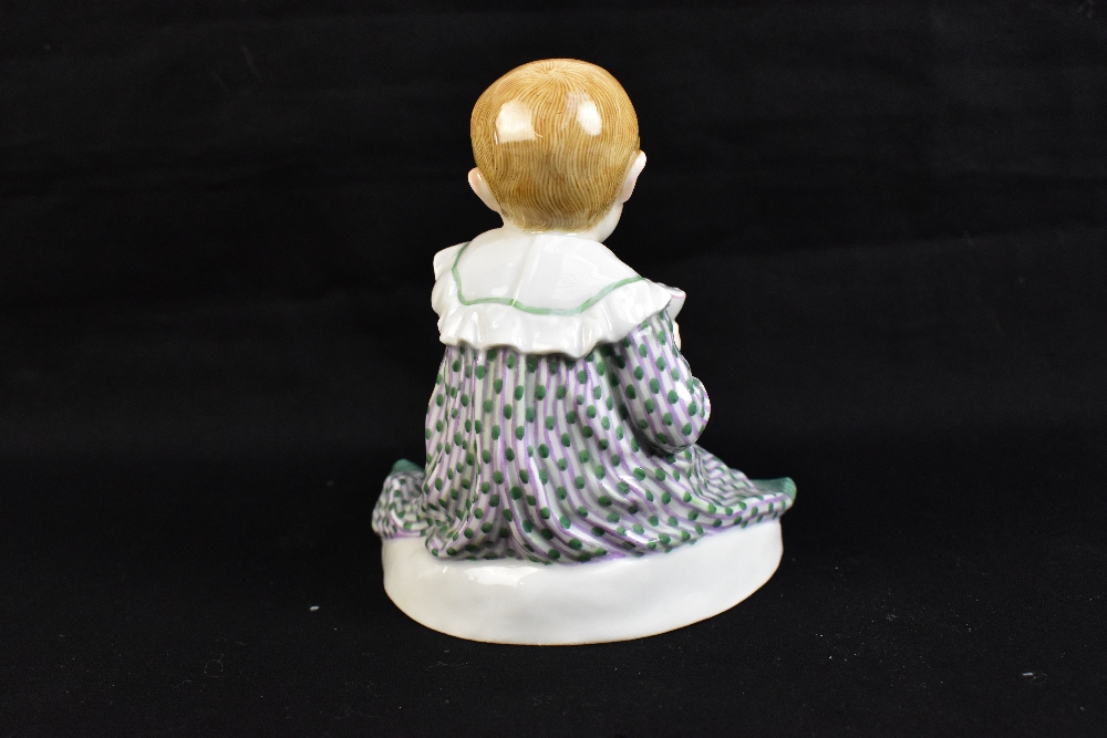 MEISSEN; a 20th century figure group of a young child seated with a puppy at their feet, painted - Image 4 of 6