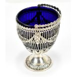 A George III hallmarked silver pedestal swing handled bowl, with pierced and cast swag decoration,