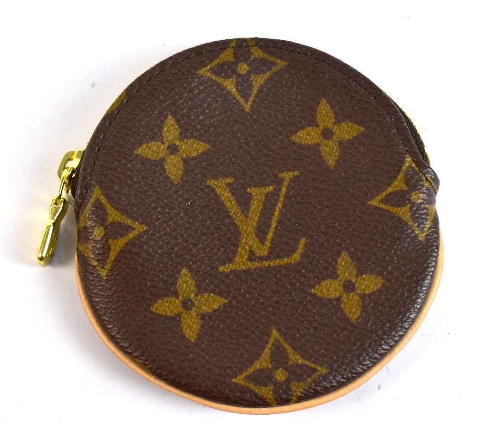 LOUIS VUITTON; a Monogrammed canvas round coin purse, with beige leather trim and gold-tone hardware