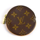 LOUIS VUITTON; a Monogrammed canvas round coin purse, with beige leather trim and gold-tone hardware