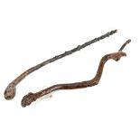 Two gnarled walking sticks, the slightly longer 94cm (2).