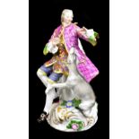 MEISSEN; a figure group of Gentleman with Hound, modelled by Eberlein c1750, painted mark to back of