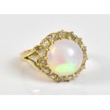 A 9ct yellow gold opal and diamond dress ring, size I, approx 4.2g.Additional InformationThere are