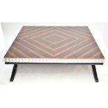 A good quality contemporary coffee table of large proportions with simulated coromandel veneered