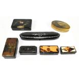 Five Victorian snuff boxes including an oval horn example, a Victorian papier-mâché spectacle case