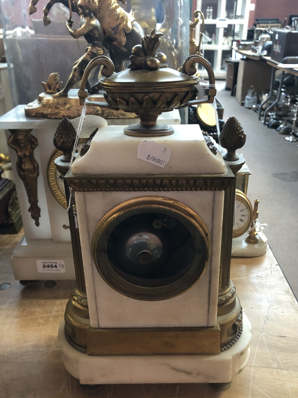 A late 19th century French white marble gilt metal mounted mantel clock, the white enamel dial set - Image 10 of 14
