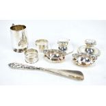 A group of variously hallmarked silver items including mug, two Capstan inkwells (both lacking