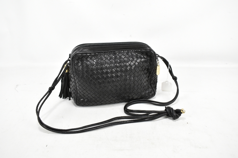 COSCI, ITALY; a navy blue woven leather shoulder bag with gold hardware, tassel and leather shoulder - Image 2 of 2