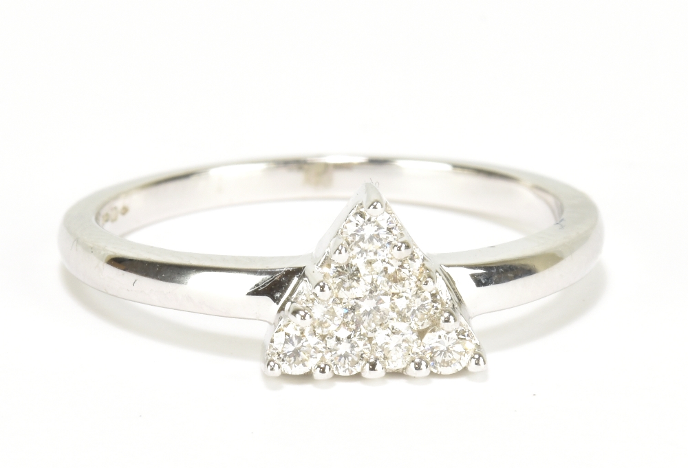 An 18ct white gold ten stone diamond ring with triangular shaped platform, size N, approx 3g.