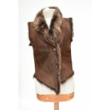 JOSEPH; a 100% chocolate brown lambswool gilet with four buttons, size 38.