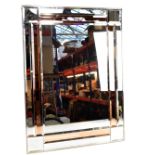 A contemporary rectangular mirror with bevelled glass, 92 x 66.5cm.