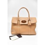 MULBERRY; a bayswater 'nude' patent leather handbag sold with correct dust bag, care card and