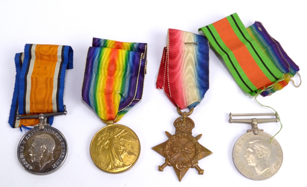 WITHDRAWN A WWI medal trio awarded to 92457 Gnr. H. Hockey R.A with further ephemera including