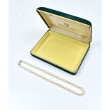 MIKIMOTO; a string of cultured pearls with silver clasp, length 42cm.Additional