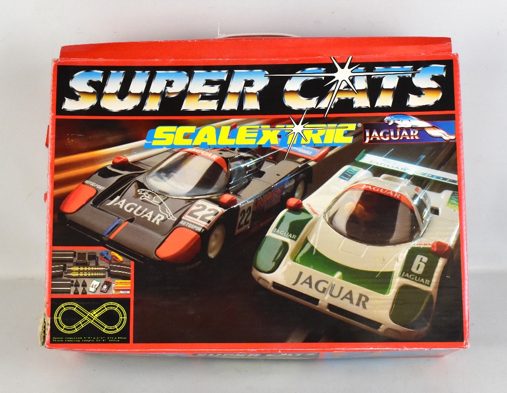 SCALEXTRIC; a boxed 'Super Cats' set, with Jaguar cars.