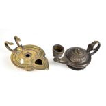 An early 19th century patent self lighting oil lamp based on a Roman original with twin serpent
