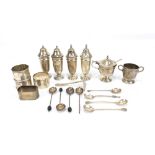 A group of variously hallmarked silver items including cruets, napkin rings and spoons, approx 14.