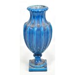 CLEMENT MASSIER; a large turquoise glazed lobed vase with moulded floral decoration and integral