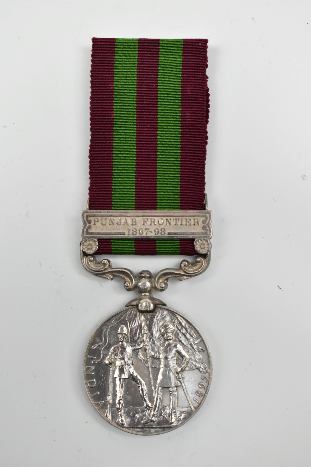 An India Medal 1895-1902 with 'Punjab Frontier 1897-98' clasp awarded to Major C.W. Johnson R.A.M.C.