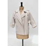 REISS; an 80% wool mix pink short length coat with side zip fastening, size small.