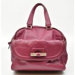 JIMMY CHOO; a purple Justine Napa leather handbag with gold-tone hardware, with slip and side-