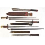 Four late 19th/early 20th century bayonets including a French example, signed 'Mre d' Armes de St.