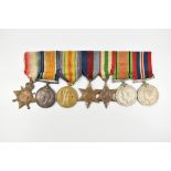 A WWI and WWII medal group of seven, the WWI trio awarded to 10525 Pte. W.J. Roberts Cheshire